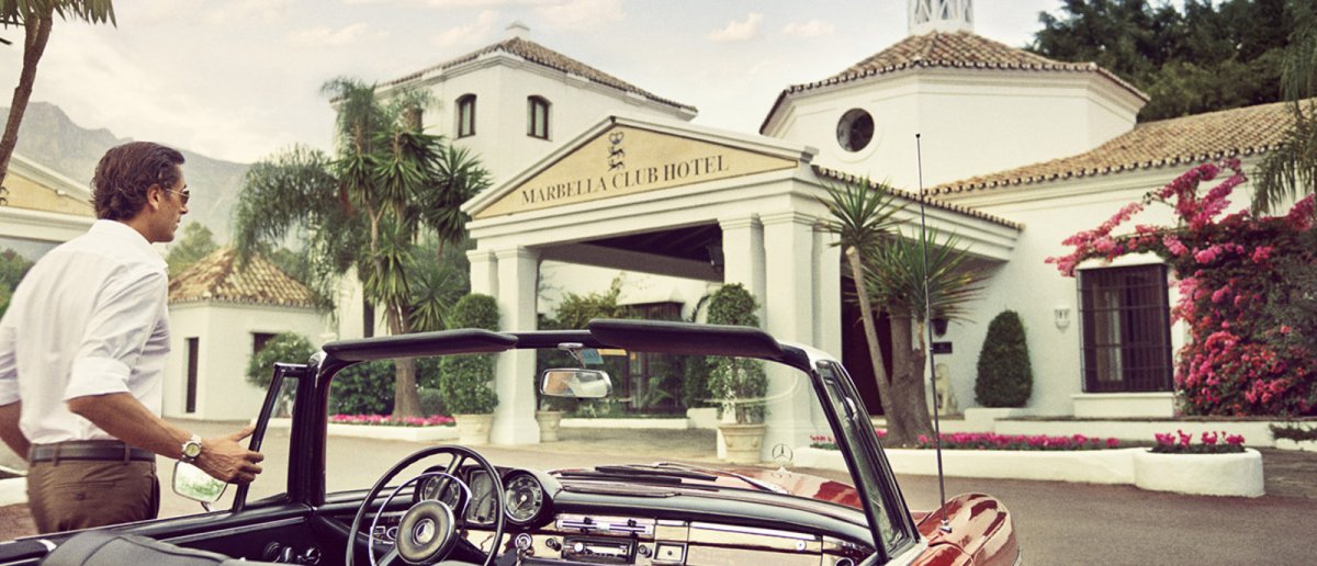 A vintage cabrio by the entrance to Marbella Club Hotel