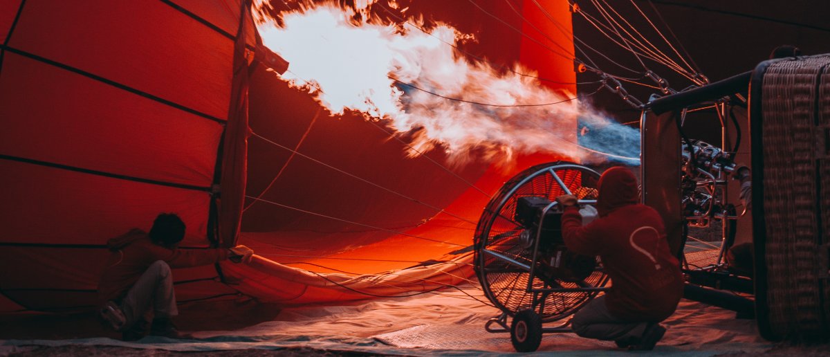 A hot air balloon being prepared for liftoff.